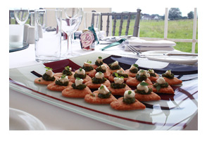 Parmesan shortbreads with basil pesto and Capricorn goat�s cheese